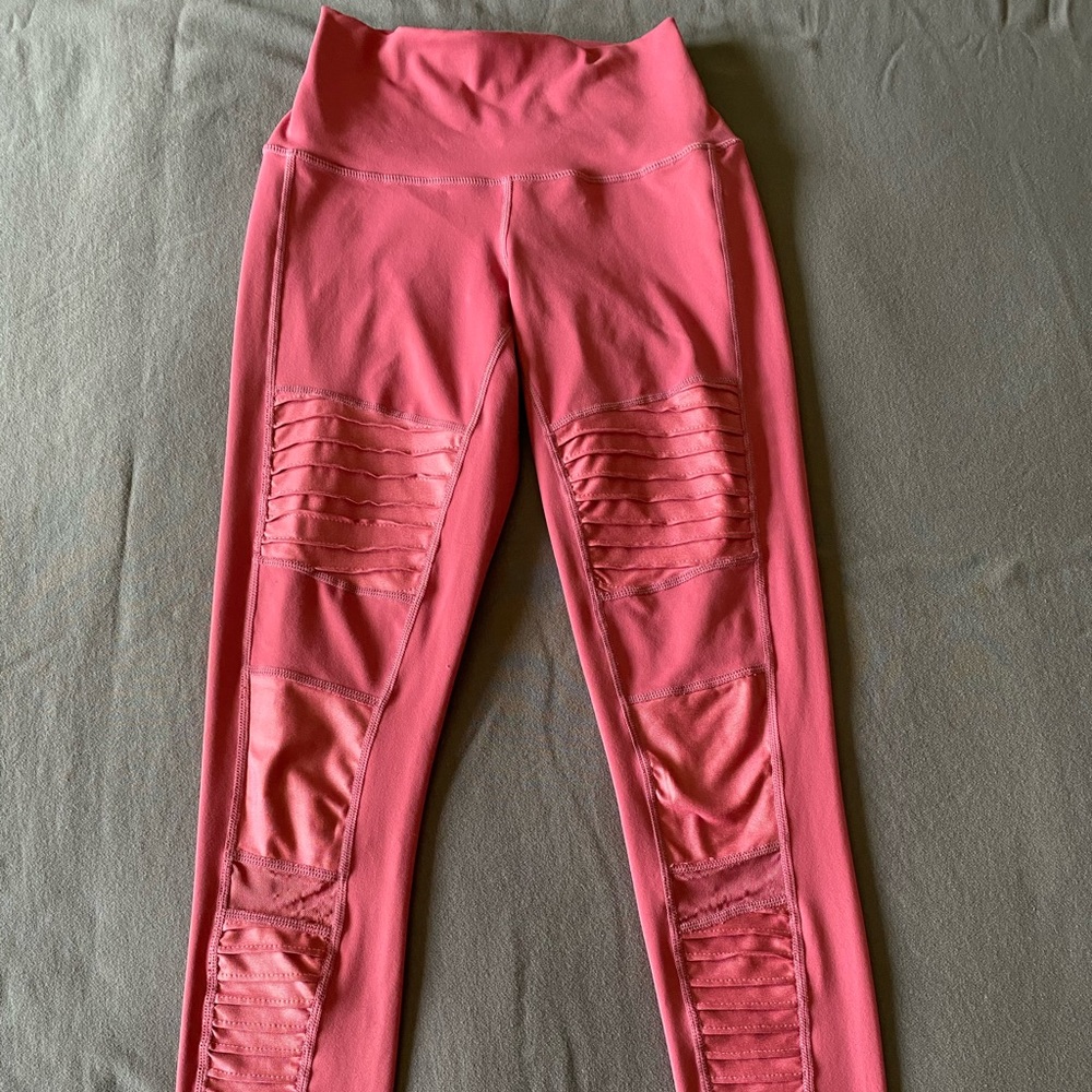 Rose colored IAB mfg moto XS leggings